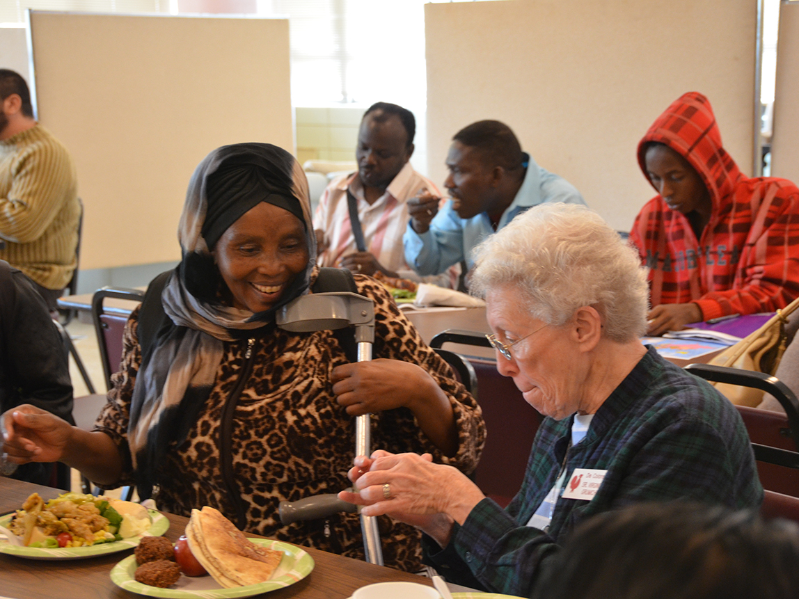 Sisters visit the International Institute once a month to bring bread to clients served by the nonprofit organization that serves immigrant and refugees new to St. Louis.