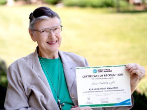 Sister Dolores Lytle and certificate recognizing her completion of the “Laudato Si’ Animator” course.